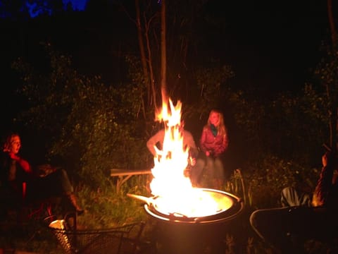 Enjoy a campfire in the backyard.