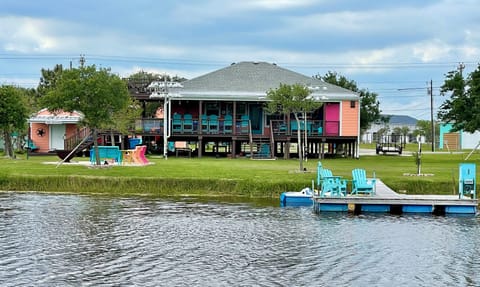 Large, grassy yard and 2 acre stocked pond beckon to outdoor activities. 