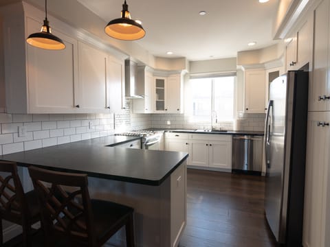 Stainless appliances, Beautiful Honed Granite Counter, and lots of Cabinets