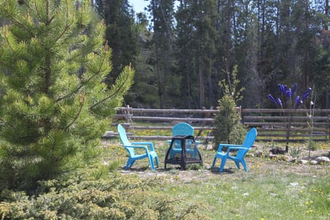 Private outdoor courtyard with fire pit, BBQ grill,  and eating area