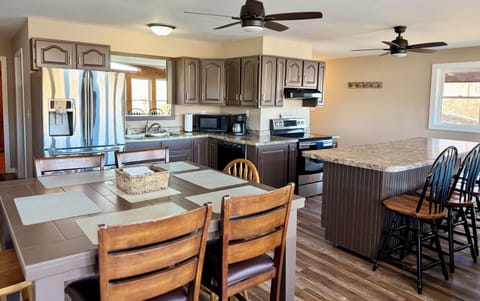 Dining areas, kitchen, and entrance way