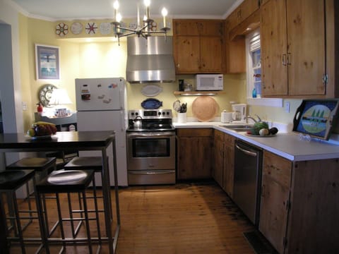 Updated Kitchen with Original Pine Cabinets and Floor