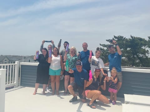 Obligatory rooftop deck group photo.😀📸