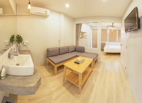 Family Suite, 1 King Bed with Sofa bed | Premium bedding, in-room safe, blackout drapes, iron/ironing board