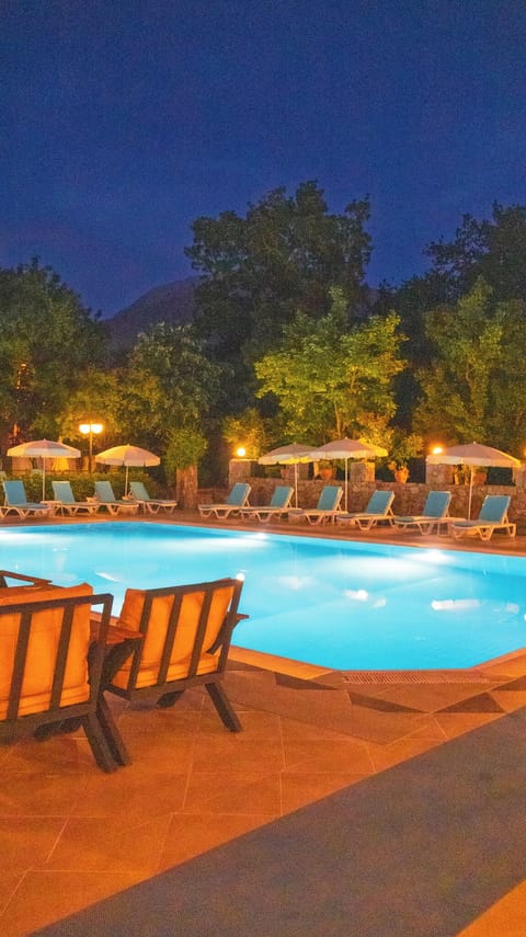 Outdoor pool, pool umbrellas, sun loungers