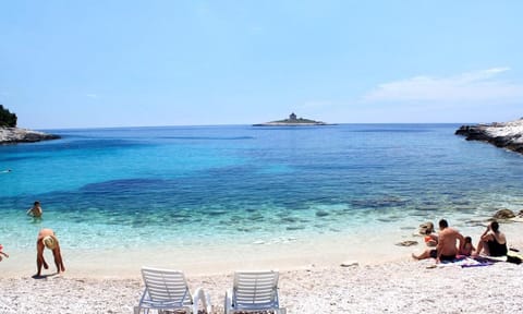 Beach nearby, white sand, 2 beach bars