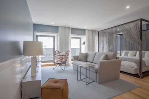 Luxury Studio, Balcony | Living area | Flat-screen TV