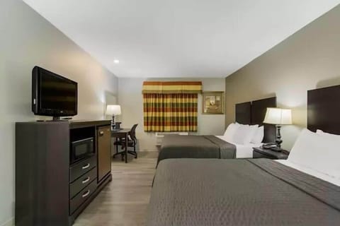 Standard Room, 2 Queen Beds, Non Smoking | In-room safe, desk, soundproofing, iron/ironing board