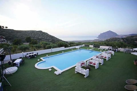 Seasonal outdoor pool, open 8:00 AM to 8:00 PM, pool umbrellas