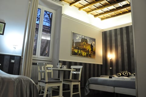 Triple Room | Frette Italian sheets, minibar, in-room safe, desk