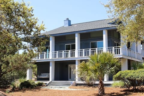 This 5 BR home is across the street from Boardwalk 3A and has golf views!