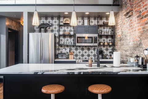 A polished detail in an industrial-cool kitchen.