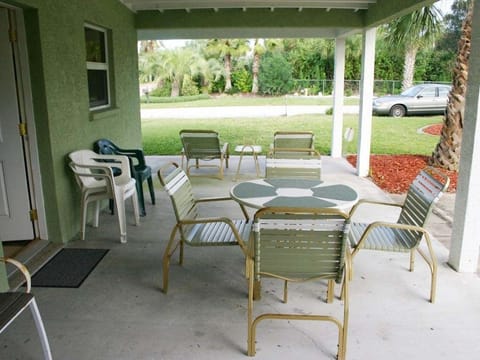 Patio with plenty of seating and outside shower.