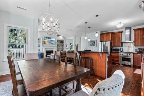 Dining area overlooks the kitchen and great room