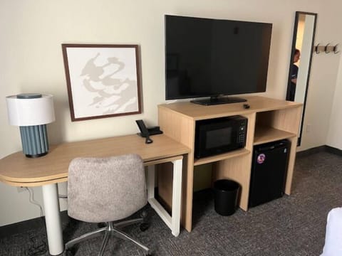 Premium bedding, laptop workspace, blackout drapes, iron/ironing board