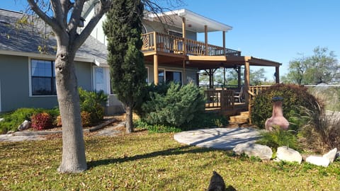 Back decks looking out onto lake. Perfect spot to have a glass of wine!