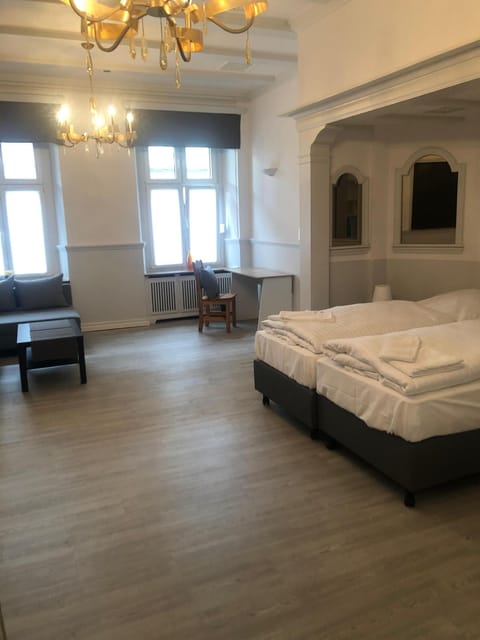 Suite, Private Bathroom | Desk, free WiFi, bed sheets