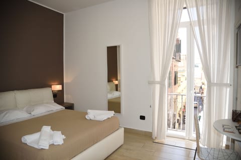 Comfort Double Room, Balcony, City View | Minibar, in-room safe, desk, soundproofing