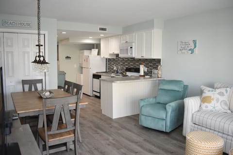 Kitchen with full washer and dryer