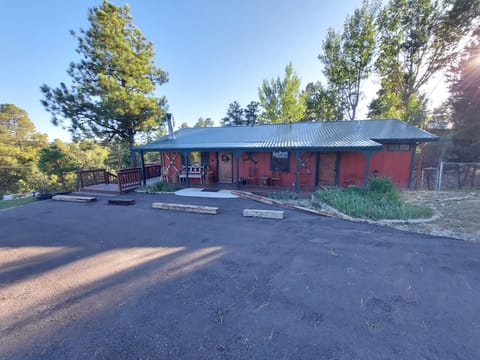 Paved driveway & parking area.  Front door ramp for easy access to Cabin. 