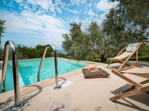 Water, Cloud, Sky, Swimming Pool, Tree, Plant, Outdoor Furniture, Sunlounger, Leisure, Landscape