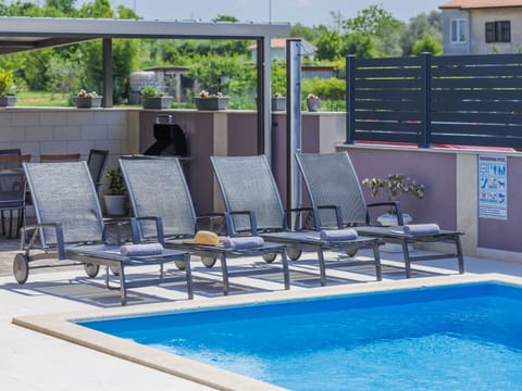 Water, Property, Swimming Pool, Azure, Shade, Outdoor Furniture, Sunlounger, Chair, Tree, Sky