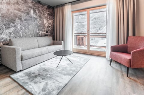 Family Room | Down comforters, in-room safe, individually decorated