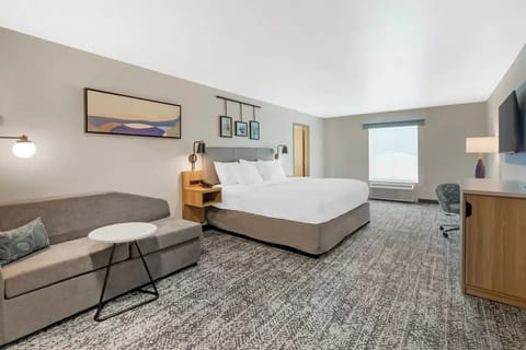 Suite, 1 King Bed, Non Smoking | Desk, iron/ironing board, free cribs/infant beds, free WiFi