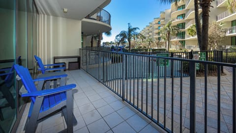 Breathe in the fresh air and relax on the balcony, soaking up the tranquil views of the lush surroundings