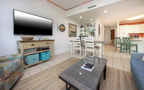 Embrace cozy gatherings in the living area, including a sofa with queen sleeper, queen sleeping area, and beautiful views