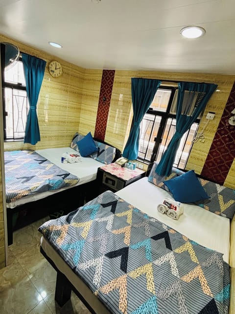Deluxe Quadruple Room, 2 Double Beds, Accessible, Non Smoking | In-room safe, desk, blackout drapes, soundproofing