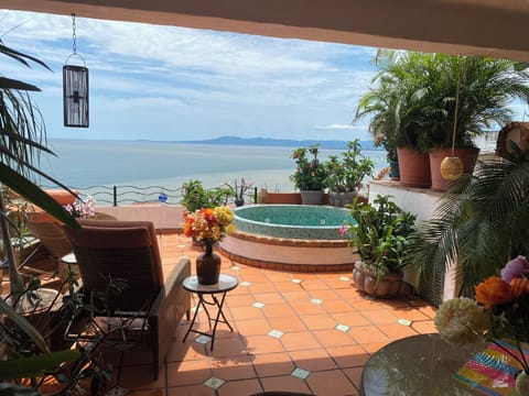 Your own cozy terrace and jacuzzi with an amazing view.