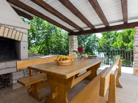 Table, Property, Furniture, Plant, Wood, Shade, Outdoor Furniture, Outdoor Table, Interior Design, Building