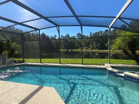 South facing pool overlooking lake and conservation area
