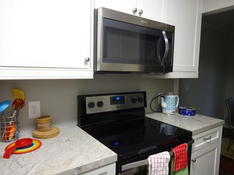 Kitchen with stainless steel appliance