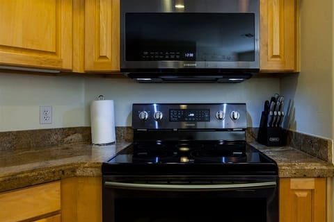 Fully stocked kitchen with matching sleek appliances