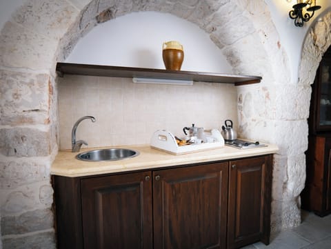 Superior Apartment, Courtyard View | Private kitchen | Fridge, stovetop, cookware/dishes/utensils