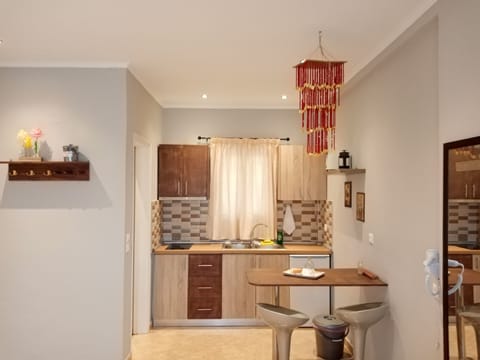 Comfort Apartment, Beachfront | Private kitchen | Fridge, microwave, stovetop, espresso maker