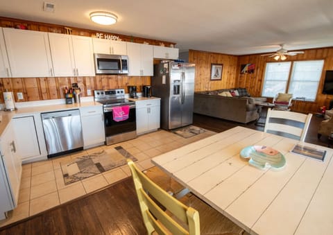 The kitchen, dining room and the living room.