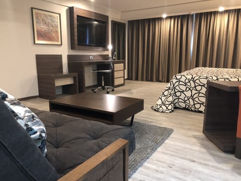 Deluxe Suite, 1 King Bed | Egyptian cotton sheets, premium bedding, down comforters, in-room safe