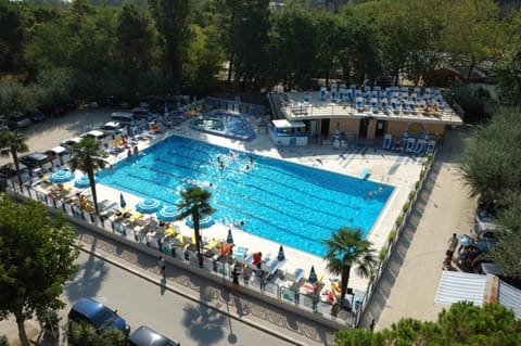 Outdoor pool, open 9:00 AM to 6:30 PM, pool umbrellas