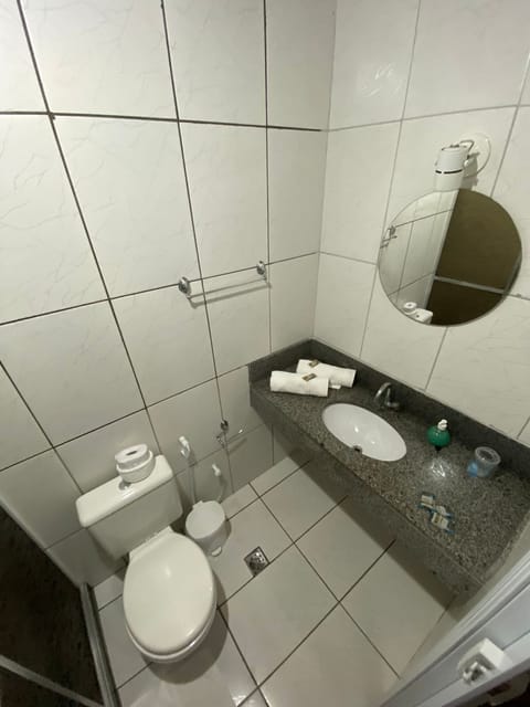 Standard Triple Room | Bathroom | Shower, hair dryer, towels