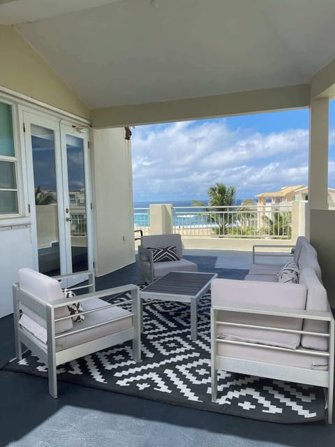 Rooftop terrace offering breathtaking views of the swimming pool and beach.