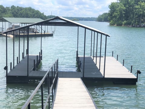 Covered dock in private cove. Perfect for floating and swimming off the dock. 