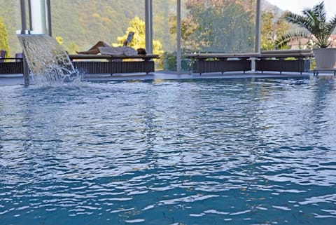 Indoor pool, pool umbrellas, sun loungers