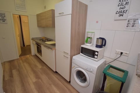 Fridge, stovetop, coffee/tea maker, cookware/dishes/utensils