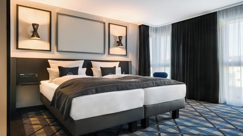 In-room safe, blackout drapes, soundproofing, free cribs/infant beds