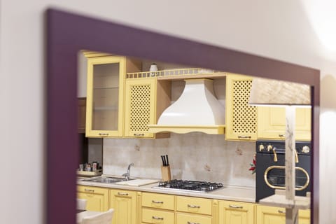 Appartamento familiare - Orchidea | Living area | Flat-screen TV