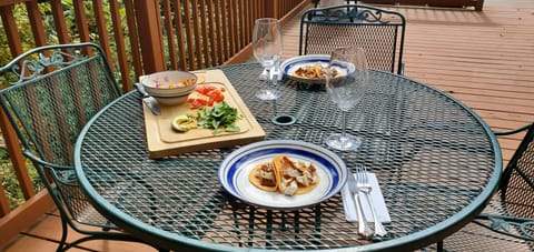 Indulging in lunch on the deck, where every bite comes with a side of nature!