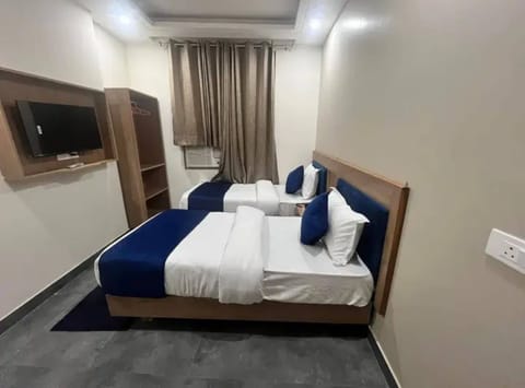Family Quadruple Room, 2 Bedrooms, Non Smoking | Soundproofing, iron/ironing board, free WiFi